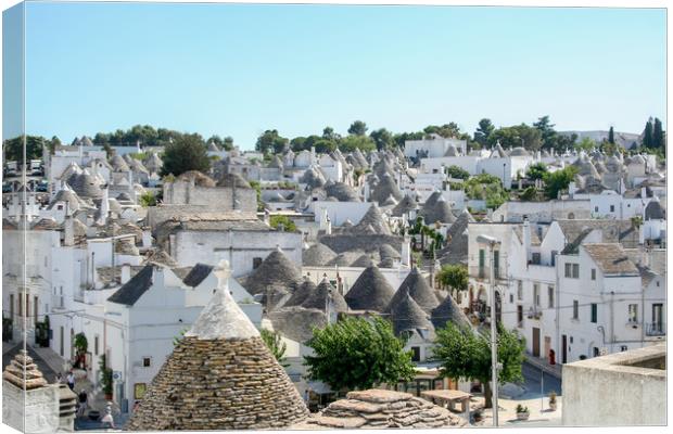 Enchanting Conical Trulli Village Canvas Print by Simon Marlow