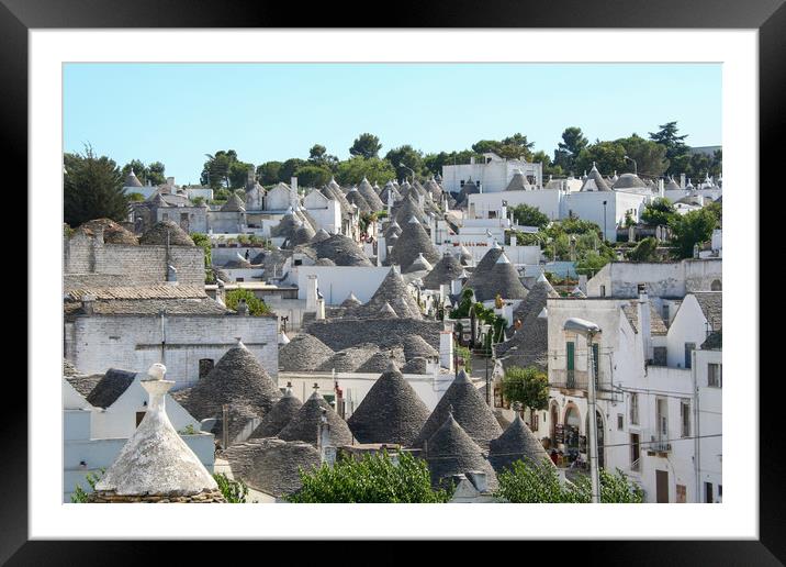 Traditional Trulli houses in Alberobello Framed Mounted Print by Simon Marlow