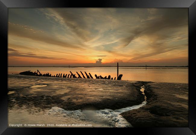 Wreck, Water and Sunset. Framed Print by Howie Marsh