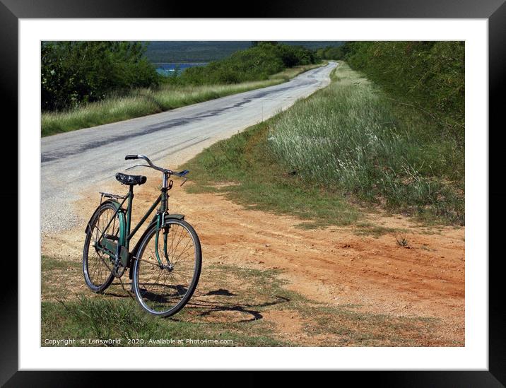 Retro bike next to an empty road in Cuba Framed Mounted Print by Lensw0rld 