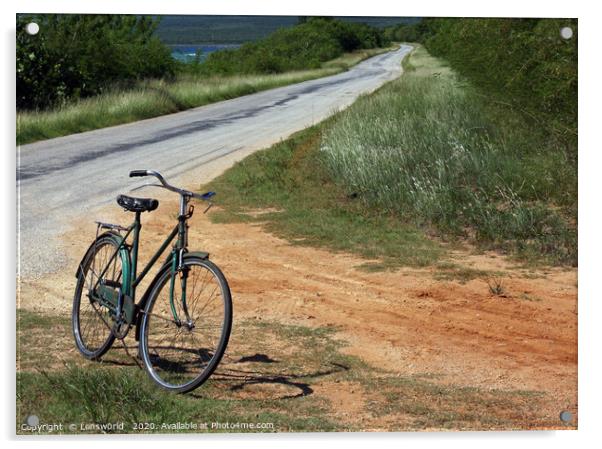 Retro bike next to an empty road in Cuba Acrylic by Lensw0rld 