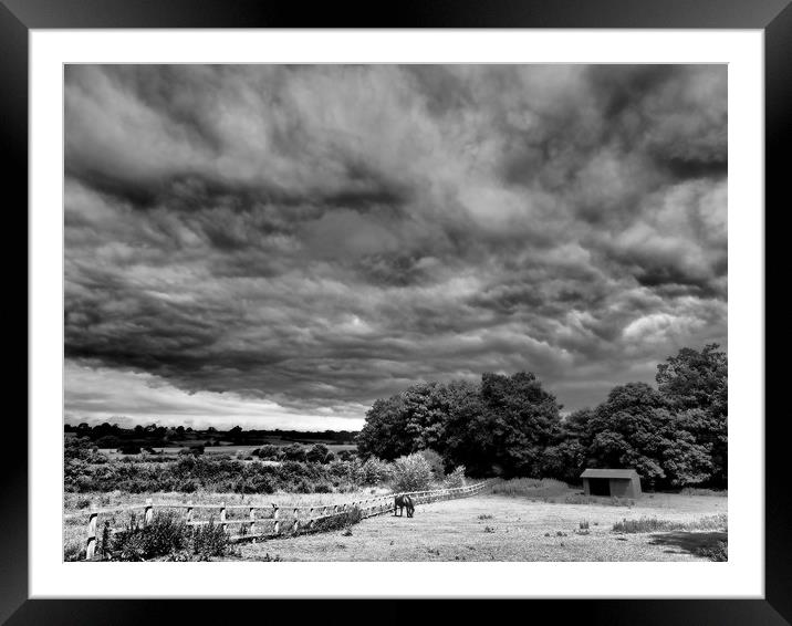 Stormy skies black and white Framed Mounted Print by mark humpage