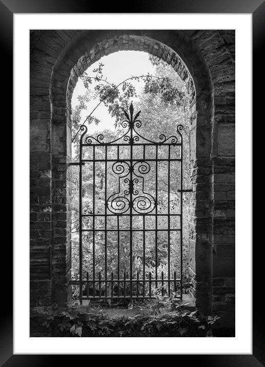 Old gate in an English walled garden Framed Mounted Print by Andrew Kearton