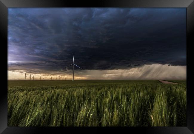 Wind farm Storm, Colorado Framed Print by John Finney