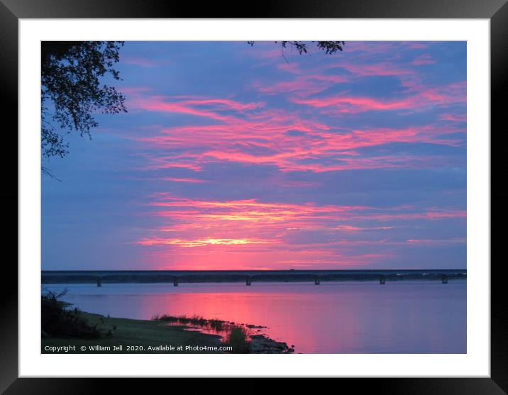 Sunset sky over Lake Texoma Bridge Framed Mounted Print by William Jell