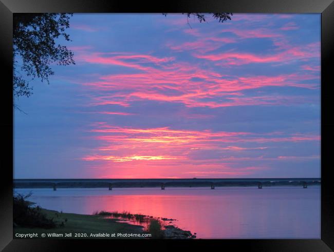 Sunset sky over Lake Texoma Bridge Framed Print by William Jell