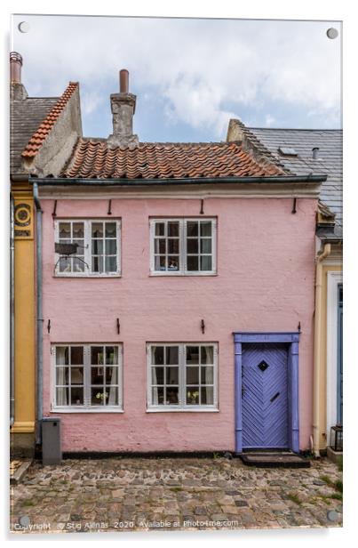 a small house in pink with a blue door on a cobble Acrylic by Stig Alenäs