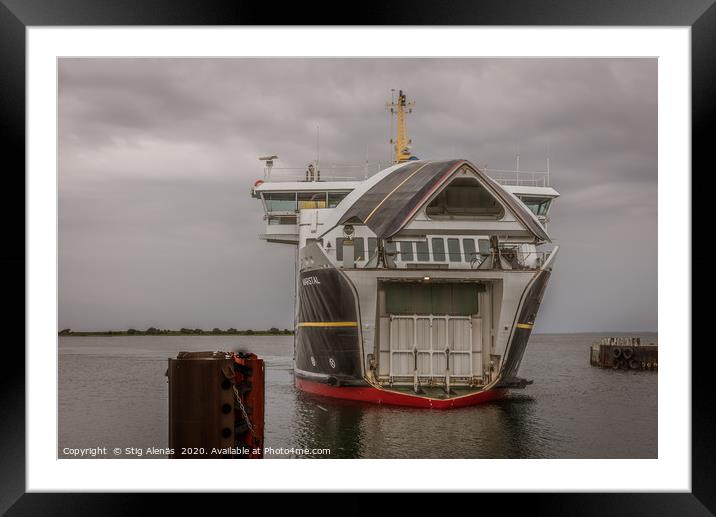 A ferryboat opening its bow when entering the harb Framed Mounted Print by Stig Alenäs