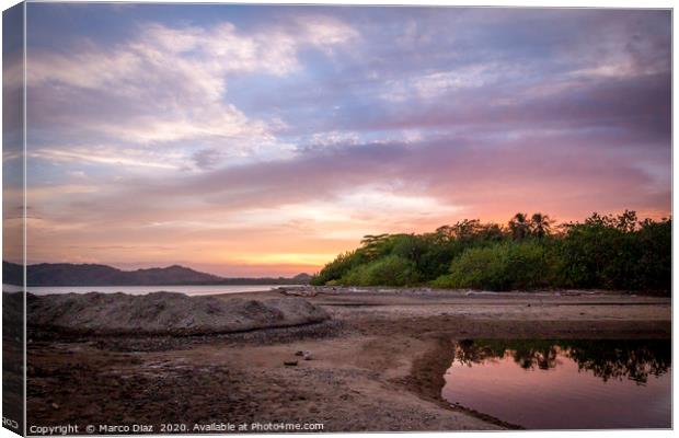 Tropical sunset, Tambor beach Costa Rica Canvas Print by Marco Diaz