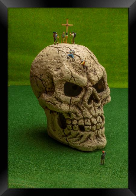 Climbing Skull Precipice Framed Print by Steve Purnell
