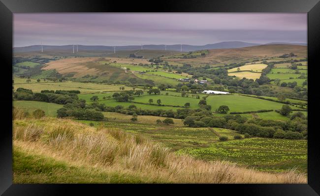 Wind turbines on the Betws Mountain Framed Print by Leighton Collins