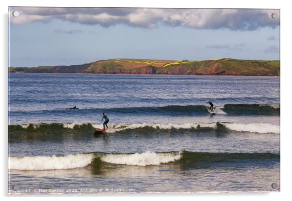 Surfing at Manorbier in Pembrokeshire Acrylic by Dan Santillo