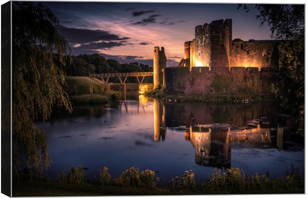Caerphilly Castle with noctilucent clouds Canvas Print by Warren Evans