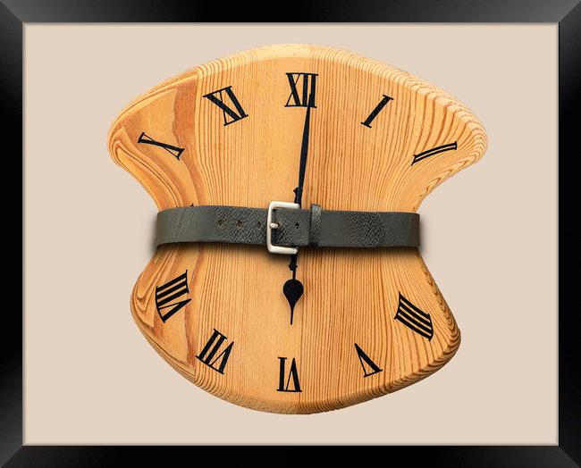 Tight for Time - Distorted Clock with belt pulled  Framed Print by Dave Collins