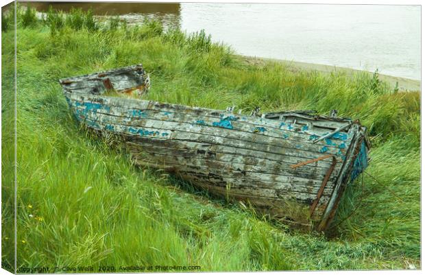 Old wrecked rowing boat at King`s Lynn in Norfolk Canvas Print by Clive Wells