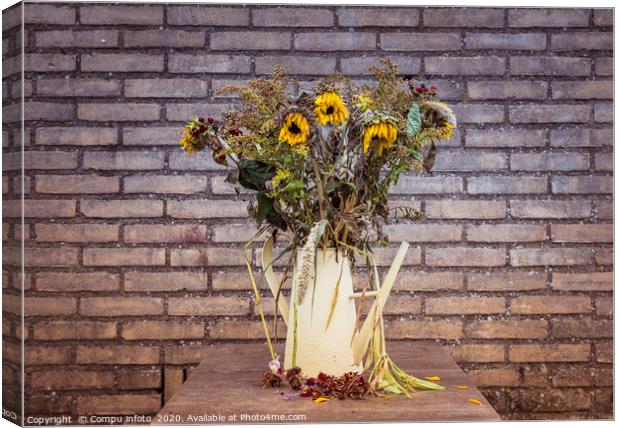 bouquet of dry flowers in yellow watering can Canvas Print by Chris Willemsen