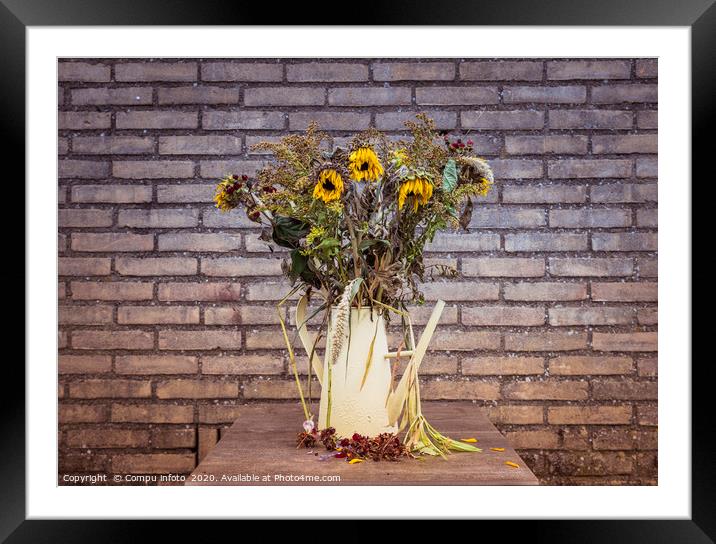 bouquet of dry flowers in yellow watering can Framed Mounted Print by Chris Willemsen