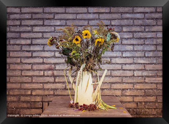 bouquet of dry flowers in yellow watering can Framed Print by Chris Willemsen