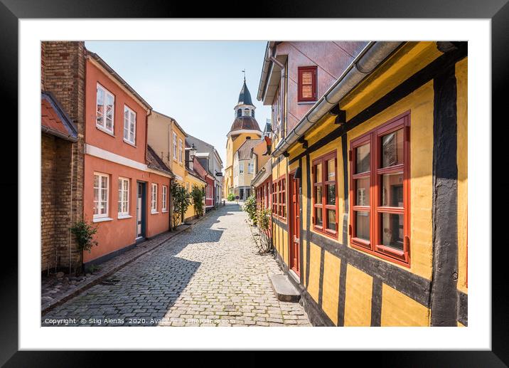 An alleyway with cobblestones and half timbered ho Framed Mounted Print by Stig Alenäs