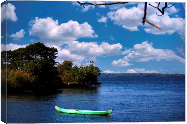 A scenic view of a boat against cloud and blue sky Canvas Print by Arpan Bhatia