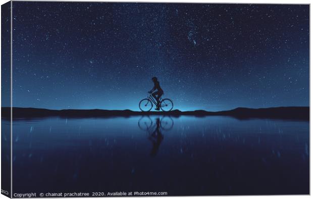 Silhouette of young woman cyclist at night sky,3d  Canvas Print by chainat prachatree