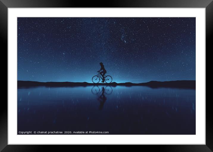 Silhouette of young woman cyclist at night sky,3d  Framed Mounted Print by chainat prachatree