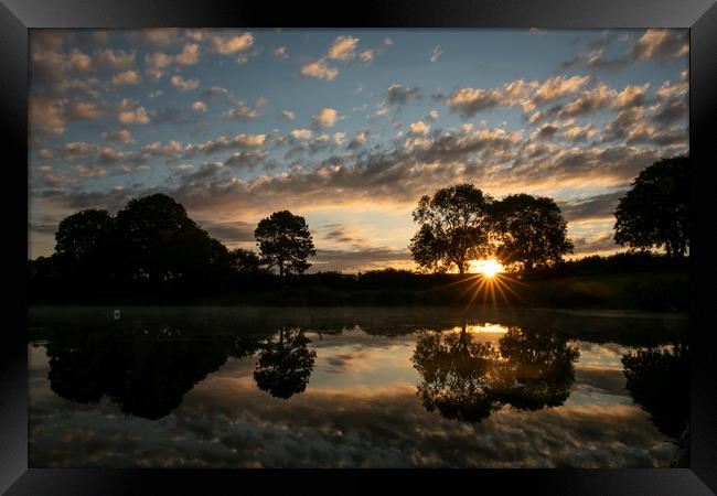 Sunrise over Sywell Country Park Framed Print by Leila Coker
