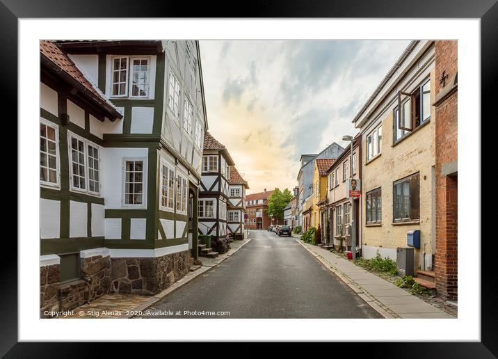 Half-timbered houses along the road in the old cen Framed Mounted Print by Stig Alenäs