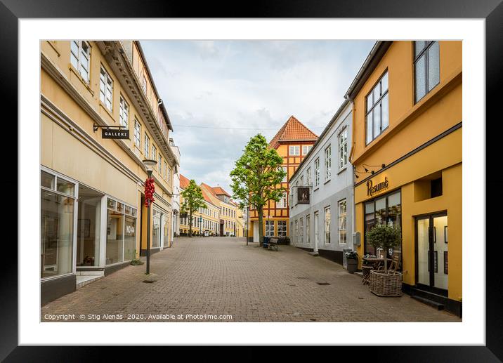 A deserted pedestrian street an evening in june at Framed Mounted Print by Stig Alenäs