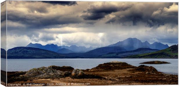 Storm clouds over the  Black & Red Cuillins. Canvas Print by Phill Thornton