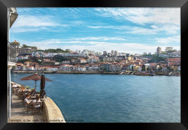 Relaxing By The Douro in Porto Framed Print by Ian Lewis