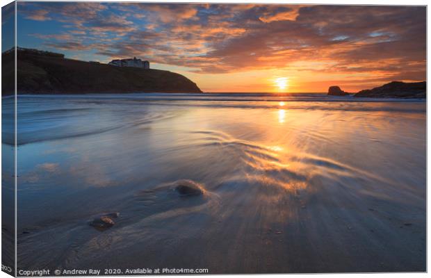 The setting sun at Poldhu Cove Canvas Print by Andrew Ray