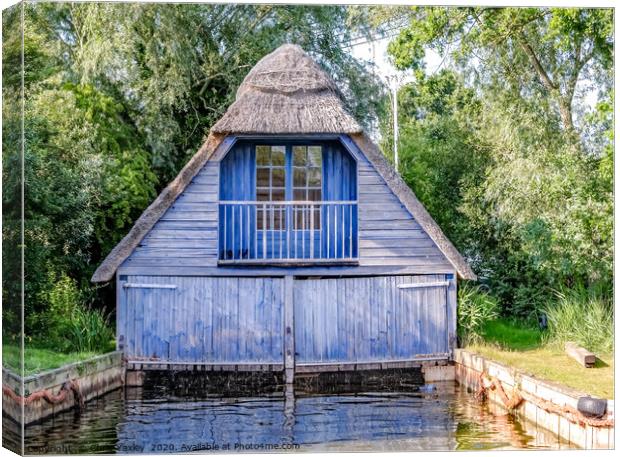 Wooden boat shed on the Norfolk Broads Canvas Print by Chris Yaxley