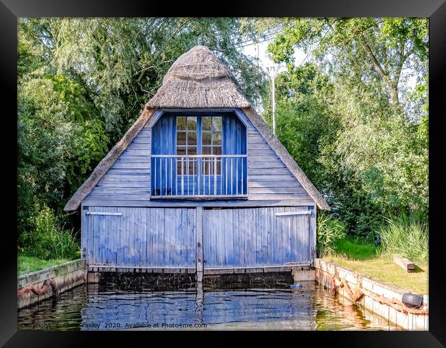 Wooden boat shed on the Norfolk Broads Framed Print by Chris Yaxley