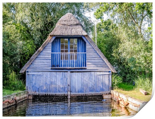 Wooden boat shed on the Norfolk Broads Print by Chris Yaxley