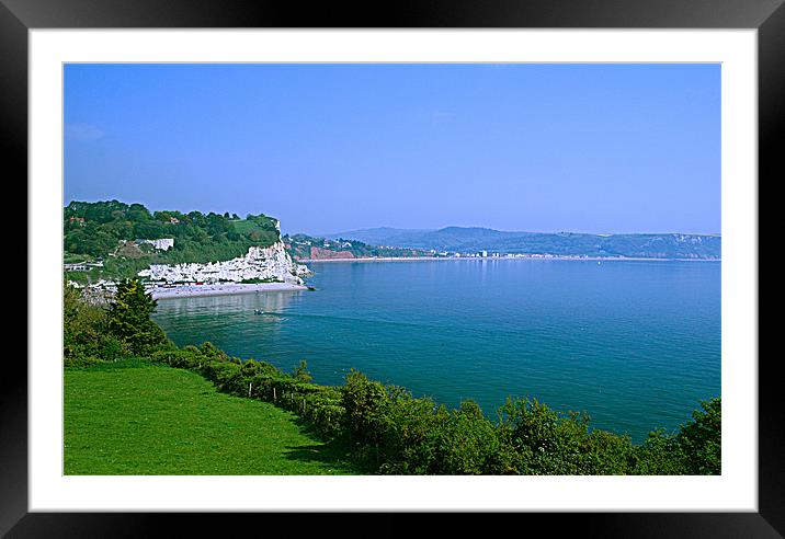 looking back at Seaton bay Framed Mounted Print by mick gibbons