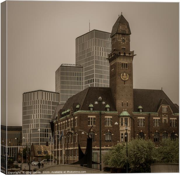 Skyline of old and new buildings against a grey sk Canvas Print by Stig Alenäs