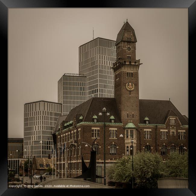 Skyline of old and new buildings against a grey sk Framed Print by Stig Alenäs