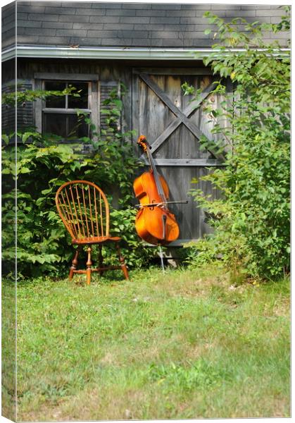 Cello and wooden chair. Canvas Print by Dr.Oscar williams: PHD