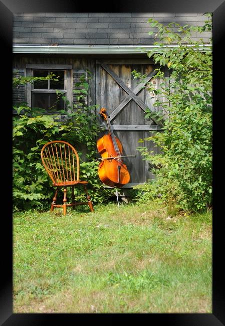 Cello and wooden chair. Framed Print by Dr.Oscar williams: PHD