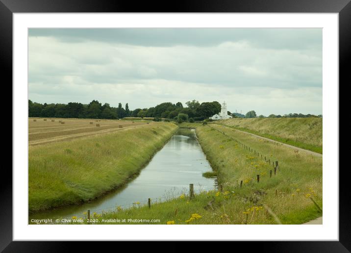 Leading lines to the Lighthouse at Sutton Bridge Framed Mounted Print by Clive Wells