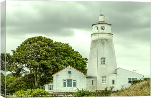 A dirty Sir Peter Scott Lighthouse still stands pr Canvas Print by Clive Wells