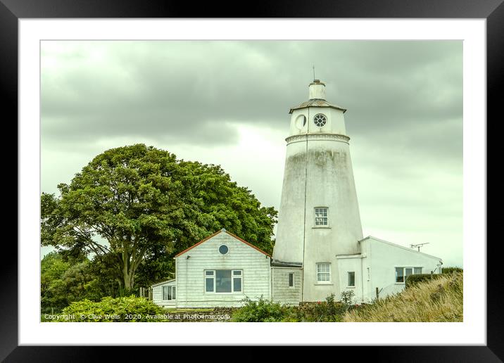 A dirty Sir Peter Scott Lighthouse still stands pr Framed Mounted Print by Clive Wells