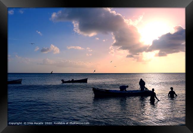 Caribbean fishermen at sunset Framed Print by Ines Porada
