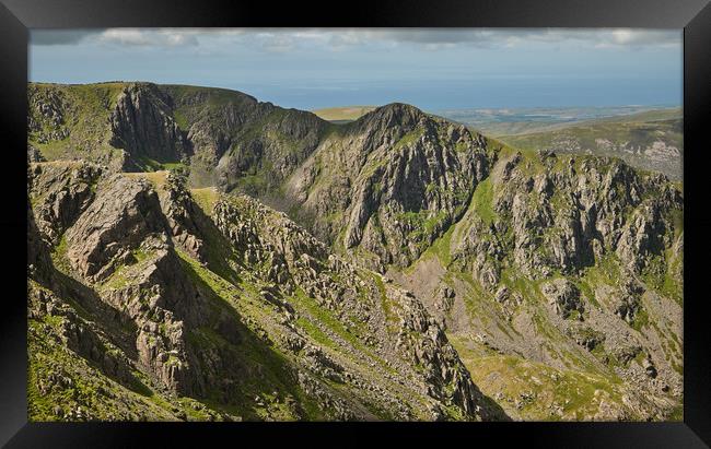 The Craggy Face of Steeple  Framed Print by John Malley
