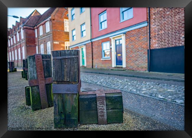 Wooden statues along Quayside, Norwich Framed Print by Chris Yaxley