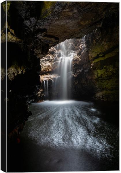 The Enigmatic Smoo Cave Waterfall Canvas Print by Stuart Jack