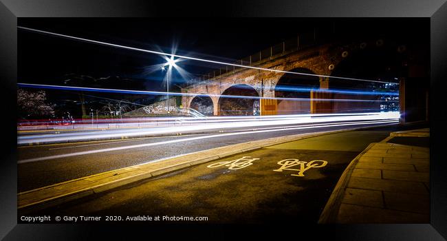 Arches Light Trails Framed Print by Gary Turner