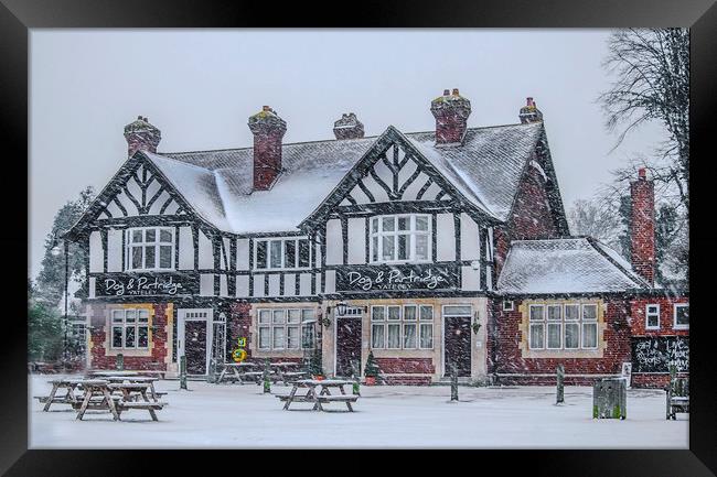The Dog & Partridge Pub in the Snow Framed Print by Dave Williams