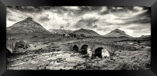 Red Cuillin mountain range and Sligachan old bridg Framed Print by Phill Thornton